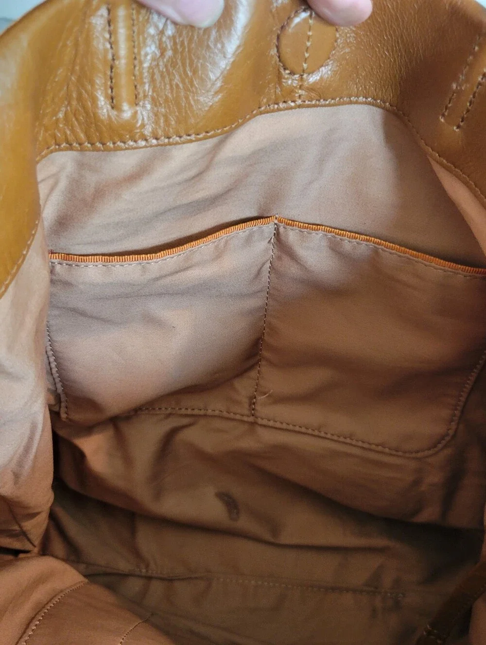 Hobo Classic Brown Leather Tote Bag With Roomy Interior.